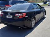 Toyota Camry 2013 годаfor8 800 000 тг. в Актобе