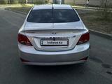 Hyundai Solaris 2014 года за 4 700 000 тг. в Актобе – фото 3