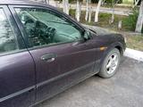 Mazda 323 1999 годаүшін400 000 тг. в Караганда – фото 2