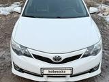 Toyota Camry 2014 годаfor8 700 000 тг. в Алматы