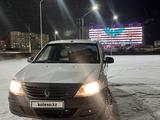 Renault Logan 2013 года за 2 650 000 тг. в Уральск – фото 5