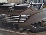 Передний бампер Hyundai Tucson 2009-2013 в Алматы – фото 2