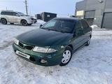 Mitsubishi Carisma 1998 года за 700 000 тг. в Астана – фото 2