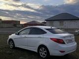 Hyundai Solaris 2013 года за 3 300 000 тг. в Актобе – фото 2