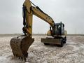 Сдам в аренду колесный экскаватор CAT с навесными (гидромолот, ямобур) в Кокшетау