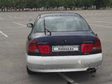 Mitsubishi Carisma 1998 года за 800 000 тг. в Астана – фото 2