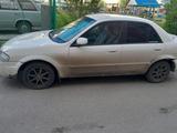 Mazda Familia 2000 года за 950 000 тг. в Петропавловск – фото 2