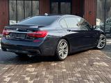 BMW 750 2017 года за 30 990 000 тг. в Алматы – фото 4