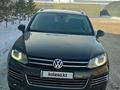 Volkswagen Touareg 2011 года за 9 500 000 тг. в Астана