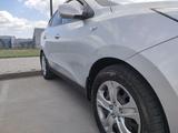 Hyundai Tucson 2012 года за 7 850 000 тг. в Астана – фото 2