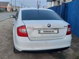 Skoda Rapid 2014 года за 4 000 000 тг. в Атырау – фото 2