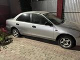 Mazda Familia 1996 года за 500 000 тг. в Алматы – фото 2