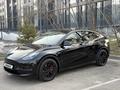 Tesla Model Y 2023 года за 16 400 000 тг. в Алматы