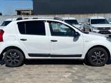 Renault Sandero 2013 года за 2 290 000 тг. в Караганда – фото 4