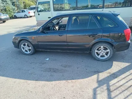 Mazda 323 2002 года за 1 800 000 тг. в Алматы – фото 7