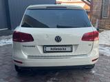Volkswagen Touareg 2010 годаүшін8 799 999 тг. в Алматы – фото 2