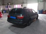 Toyota Carina E 1995 года за 990 000 тг. в Шымкент – фото 4