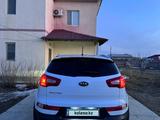 Kia Sportage 2011 года за 6 500 000 тг. в Атырау – фото 2