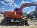 Doosan  DX140W 2010 года за 25 000 000 тг. в Шымкент