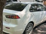 Mitsubishi Lancer 2010 годаfor4 700 000 тг. в Алматы – фото 2