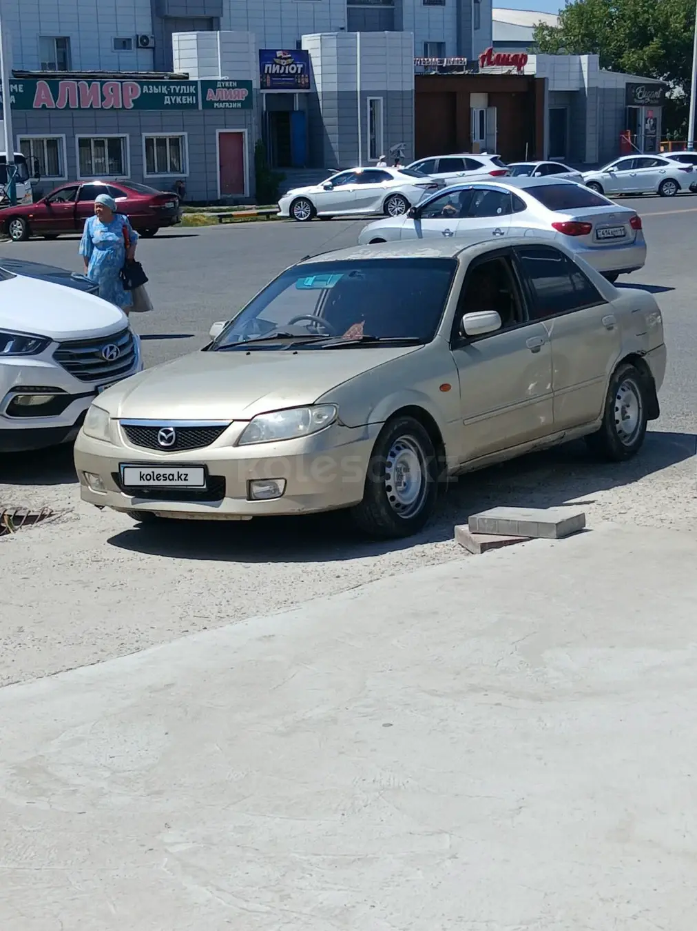 Mazda Familia, 2003