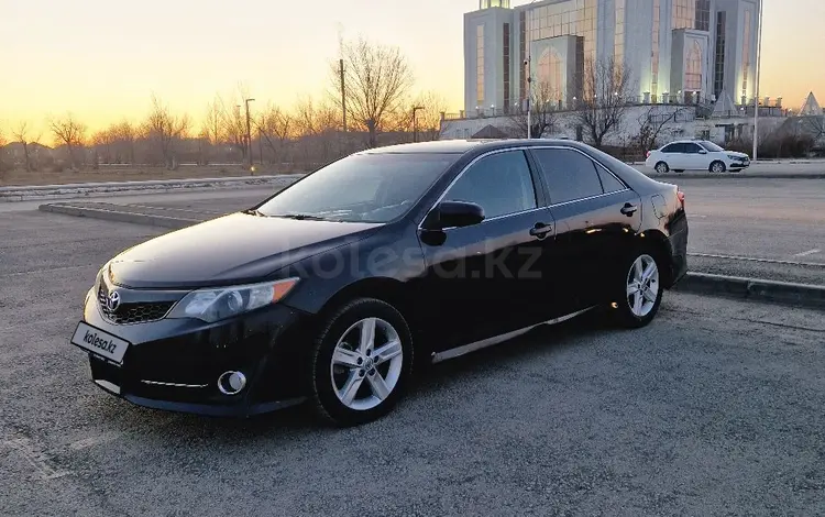 Toyota Camry 2014 годаfor8 700 000 тг. в Актобе