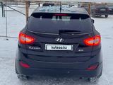 Hyundai Tucson 2013 годаүшін8 300 000 тг. в Караганда – фото 3