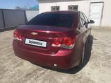 Chevrolet Cruze 2012 года за 1 800 000 тг. в Кызылорда – фото 3