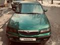 Mazda 626 1998 годаfor950 000 тг. в Абай (Келесский р-н) – фото 9