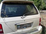 Kia Carnival 2002 года за 350 000 тг. в Талдыкорган – фото 2
