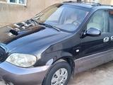 Kia Carnival 2002 года за 1 700 000 тг. в Шымкент – фото 2