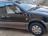 Kia Carnival 2002 года за 1 700 000 тг. в Шымкент – фото 4