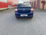 Renault Logan 2014 года за 3 650 000 тг. в Караганда – фото 2