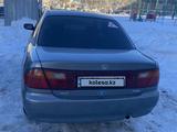 Mazda 323 1998 года за 1 950 000 тг. в Актобе – фото 5