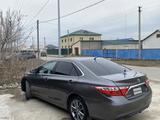 Toyota Camry 2015 года за 7 300 000 тг. в Атырау – фото 3