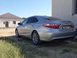 Toyota Camry 2015 года за 7 500 000 тг. в Кульсары – фото 5