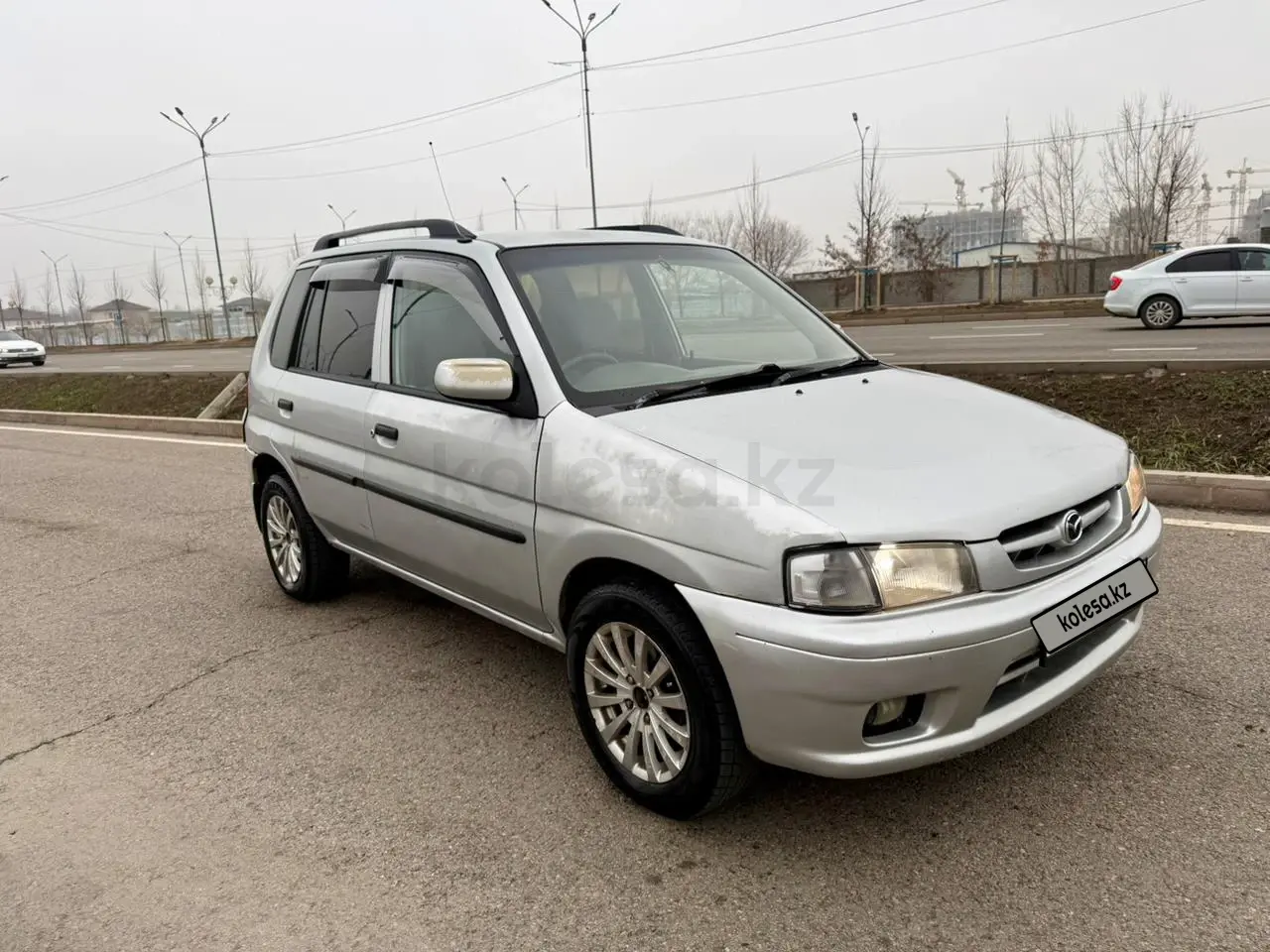 Mazda Demio, 1998