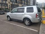 Honda Pilot 2009 года за 7 500 000 тг. в Астана – фото 2