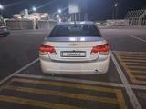 Chevrolet Cruze 2012 года за 3 300 000 тг. в Шымкент – фото 2
