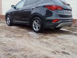 Hyundai Santa Fe 2017 года за 7 800 000 тг. в Атырау – фото 2
