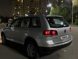 Volkswagen Touareg 2007 года за 7 500 000 тг. в Астана – фото 4
