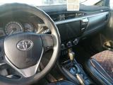 Toyota Corolla 2013 года за 7 000 000 тг. в Жетиген – фото 5