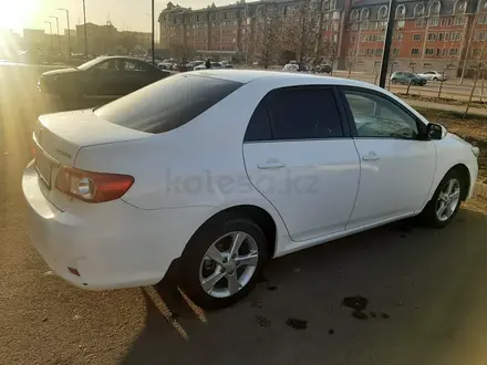 Toyota Corolla 2013 года за 6 000 000 тг. в Астана – фото 2