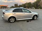 Mitsubishi Lancer 2009 года за 2 800 000 тг. в Есик – фото 4