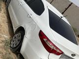 Kia Rio 2014 года за 989 989 тг. в Кульсары – фото 2