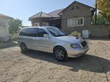 Kia Carnival 2005 годаүшін2 500 000 тг. в Шымкент – фото 2