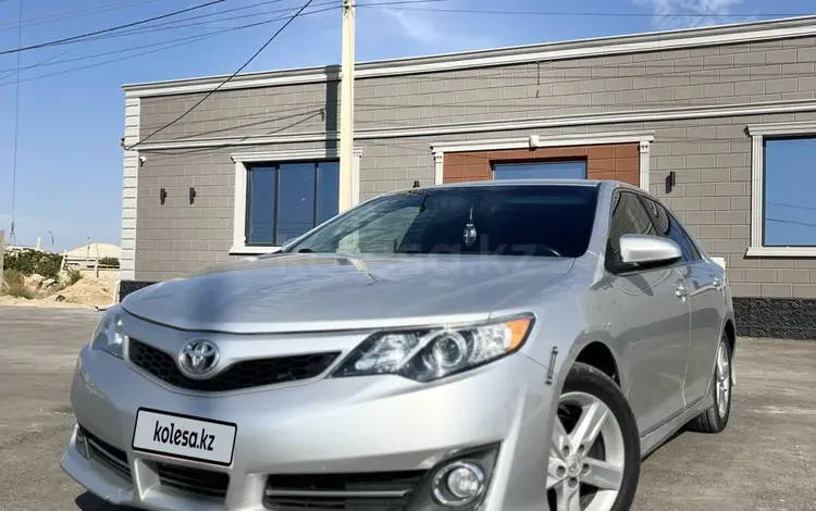 Toyota Camry 2014 года за 5 800 000 тг. в Жанаозен