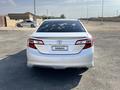 Toyota Camry 2014 года за 5 800 000 тг. в Жанаозен – фото 4