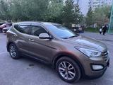 Hyundai Santa Fe 2014 года за 9 700 000 тг. в Астана