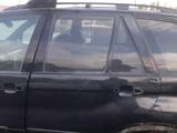 Дверь задняя левая BMW X5 за 25 000 тг. в Костанай